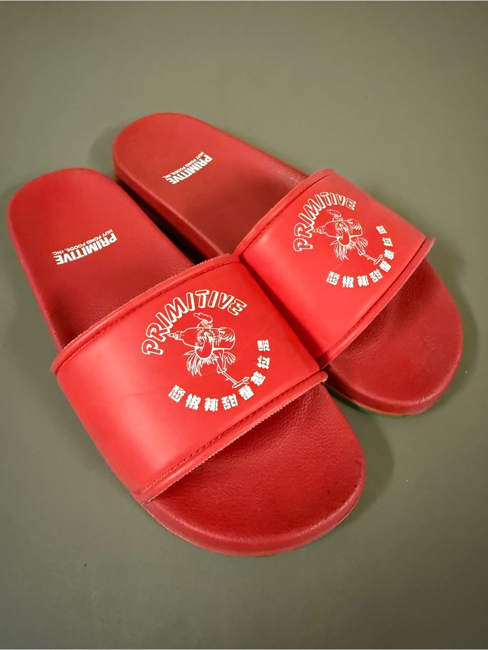 Primitive Red Slides x Sriracha